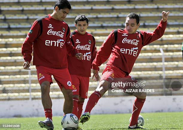 Bolivian Players of the national soccer team Edward Zenteno , Ranald Segovia and Walberto Mojica are seen during a training session in La Paz on...