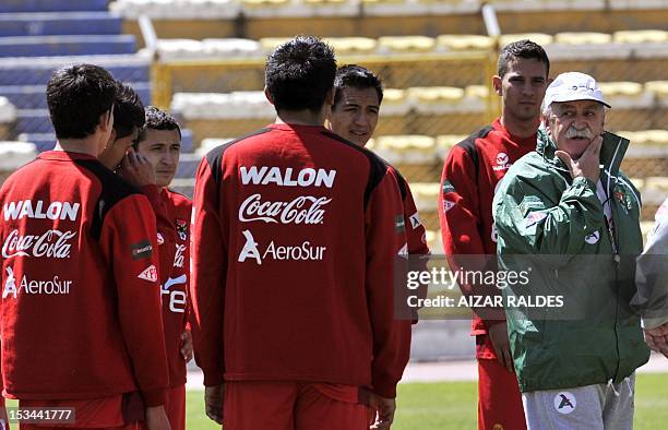 Bolivia's coach Spaniard Xabier Azcargorta gives instructions to his players during a training session in La Paz on October 5 in La Paz. Bolivia will...