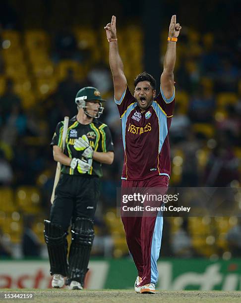 Ravi Rampaul of the West Indies celebrates dismissing Mitchell Starc of Australia during the ICC World Twenty20 2012 Semi Final between Australia and...