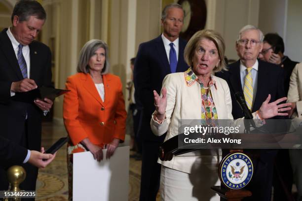 Sen. Shelley Moore Capito speaks to members of the press as Sen. Steven Daines , Sen Joni Ernst , Senate Minority Whip Sen. John Thune , and Senate...