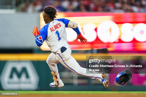 Ozzie Albies of the Atlanta Braves hits a triple in the fifth inning during the game against the Chicago White Sox at Truist Park on July 15, 2023 in...