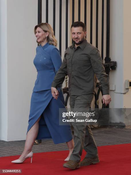 Ukrainian President Volodomyr Zelensky and First Lady Olena Zelenska attend a dinner hosted by the Presidential Palace for the 2023 NATO Summit on...