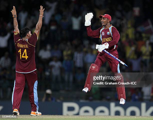 Denesh Ramdin and Ravi Rampaul of West Indies celebrates after defeating Australia during the ICC World T20 semi-final between Australia and West...
