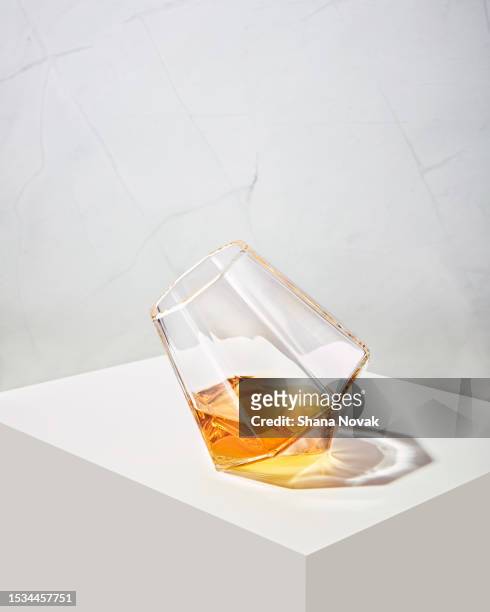 scotch brandy in a crystal glass - "shana novak" stock pictures, royalty-free photos & images