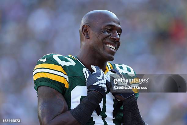 Wide receiver Donald Driver of the Green Bay Packers smiles from the sideline during the game against the New Orleans Saints at Lambeau Field on...