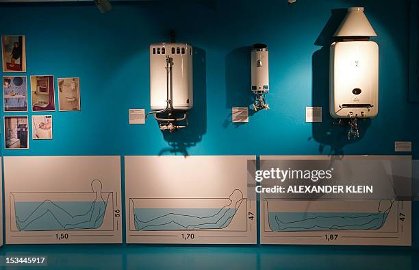 Water heating elements are seen at the Brennpunkt museum in Vienna on October 3, 2012. Fascinated by contraception, chimneysweeps, or magic boxes?...