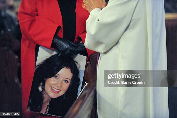 Picture of Jill Meagher held by Councillor Linda Bell Woods during a Memorial Service for the murdered journalist at St. Peter's Church on October 5,...