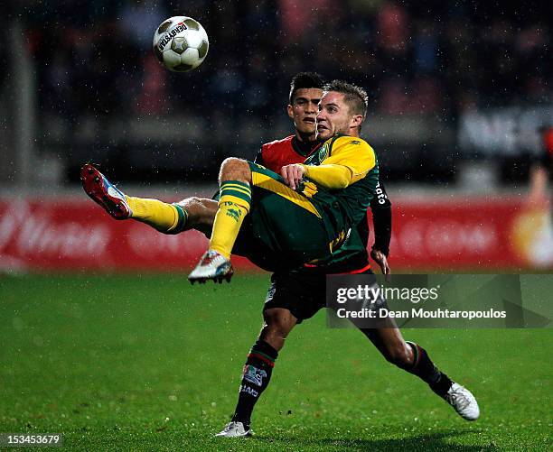 Navarone Foor of NEC defends against Aaron Meijers of Den Haag during the Eredivisie match between NEC Nijmegen and ADO Den Haag at Goffertstadion on...