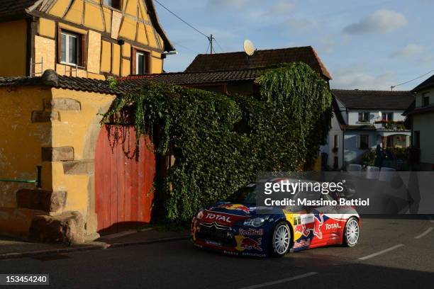 Sebastien Loeb of France and Daniel Elena of Monaco compete in their Citroen Total WRT Citroen DS3 WRC during Day One of the WRC Rally of France on...