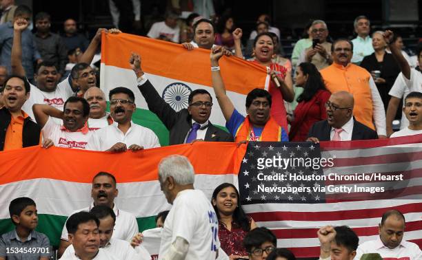 Supporters of India's prime minister, Narendra Modi cheer before the Howdy Modi event at NRG Stadium day, Sept. 22 in Houston.