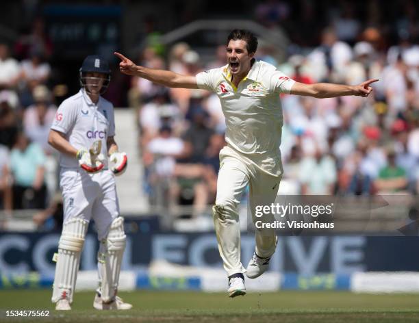 Pat Cummins of Australia celebrates taking the wicket of England's Joe Root during the LV= Insurance Ashes 3rd Test Match between England and...