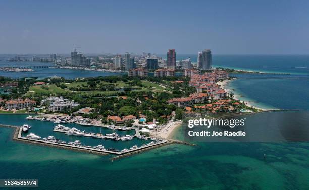 In an aerial view, Fisher Island along with Miami Beach sit next to the Atlantic Ocean on July 11, 2023 in Miami, Florida. The surface ocean...