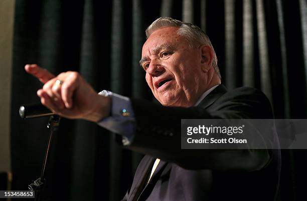 Former Wisconsin Governor and current Republican candidate for the state's U. S. Senate seat Tommy Thompson speaks to workers and guests before a...