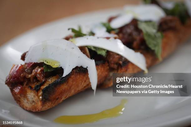 Roast peppers, eggplant, ricotta salata, toast at Ostia in Montrose Thursday, Sept. 24 in Houston.