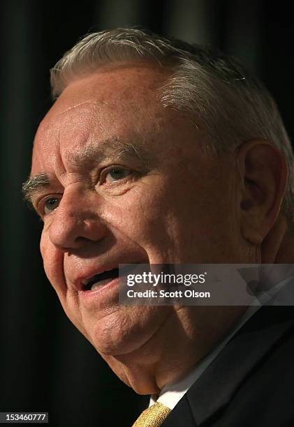 Former Wisconsin Governor and current Republican candidate for the state's U. S. Senate seat Tommy Thompson speaks to workers and guests before a...