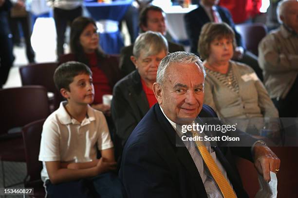 Former Wisconsin Governor and current Republican candidate for the state's U. S. Senate seat Tommy Thompson visits with workers and guests at Reed...