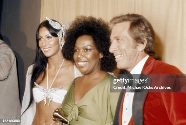 Cher, Roberta Flack (winner of Album of the Year for 'Killing me Softly With His Song' and host Andy Williams pose backstage at the 16th Annual...