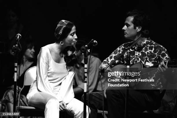 Folk and blues singers and musicians Maria Muldaur and Geoff Muldaur of the old-timey band, Jim Kweskin Jug Band, perform at the Newport Folk...