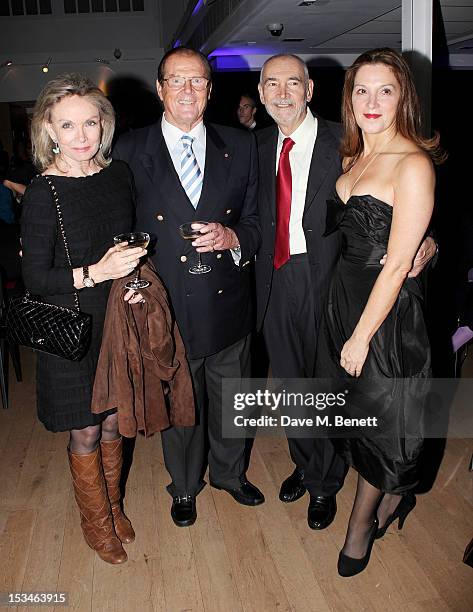 Christina Tholstrup, Sir Roger Moore, Michael G. Wilson and Barbara Broccoli attend '50 Years Of James Bond: The Auction', celebrating the 50th...