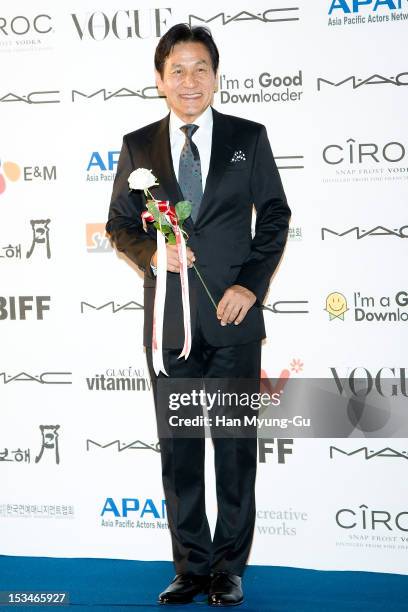 South Korean actor Ahn Sung-Ki arrives for APAN Star Road during the 17th Busan International Film Festival at the Haeundae beach on October 5, 2012...