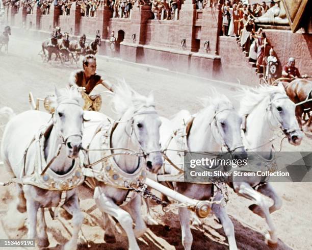 American actor Charlton Heston as Judah Ben-Hur in the chariot racing scene from 'Ben-Hur', directed by William Wyler, 1959.