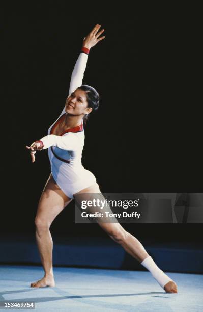 Gymnast Nellie Kim of the Soviet Union performs during an exhibition event on 1st November 1980 at Wembley Arena in London, United Kingdom.