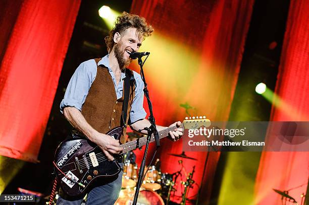 Chad Urmston of the band Dispatch performs at Radio City Music Hall on October 5, 2012 in New York City.