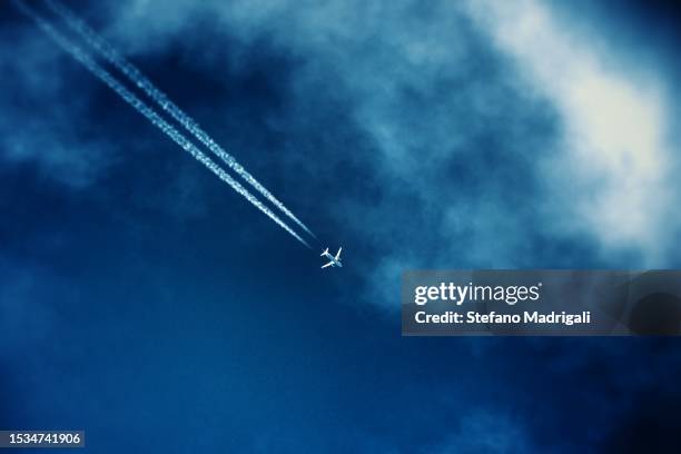 aerial ski in the clouds in the sky - aeroplane sky stock pictures, royalty-free photos & images