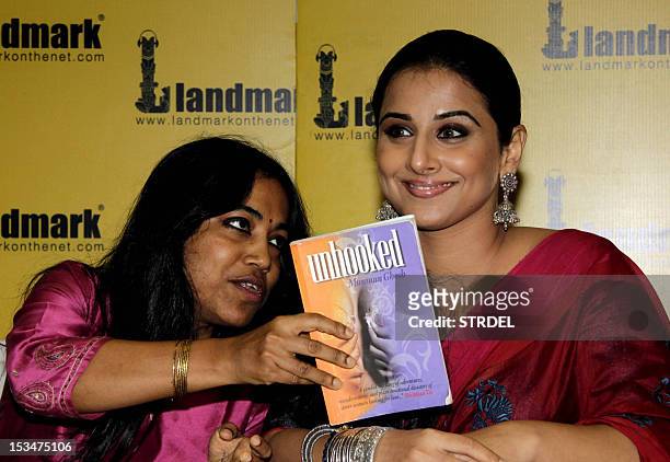 Indian Bollywood actress Vidya Balan poses during the unveiling of the book ‘Unhooked’ by Munmun Ghose in Mumbai on October 5, 2012. AFP PHOTO/STR