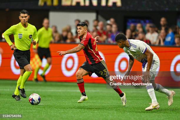 Atlanta midfielder Thiago Almada looks to pass the ball during the MLS match between Orlando City SC and Atlanta United FC on July 15th, 2023 at...