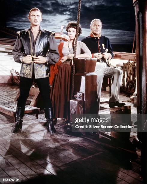 Russian actor Yul Brynner , English actress Claire Bloom and French actor Charles Boyer in 'The Buccaneer', directed by Anthony Quinn, 1958. This was...