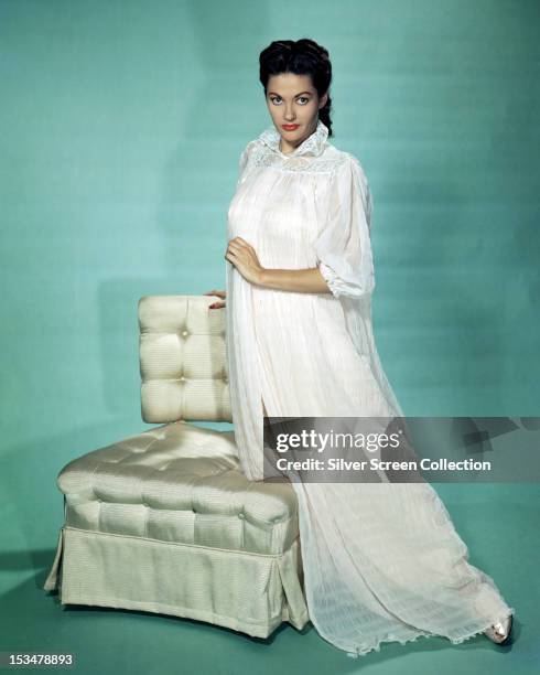 Canadian-born American actress Yvonne De Carlo in a white nightdress, circa 1950.