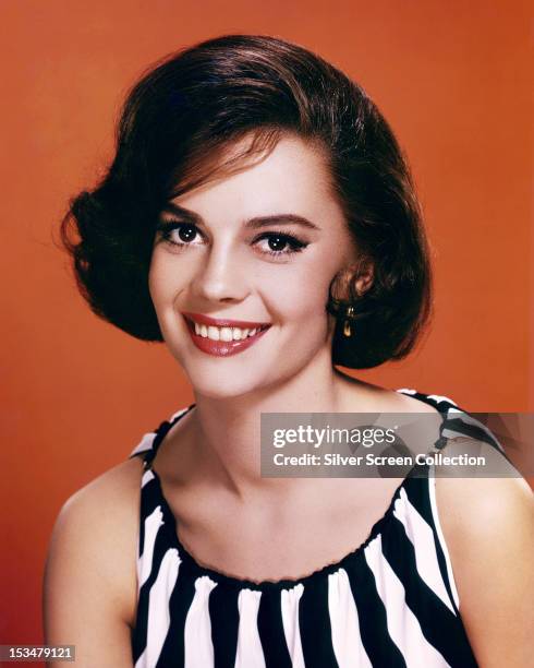 American actress Natalie Wood in a striped dress, circa 1960.