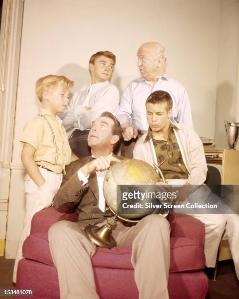 Some of the cast of the TV series 'My Three Sons', circa 1963. Clockwise, from left: Stanley Livingston, Tim Considine, William Frawley , Don Grady...