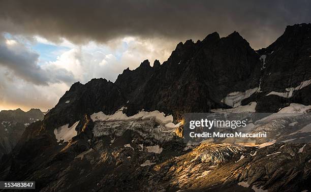 mountain and glacier at sunset - ecrin national park stock pictures, royalty-free photos & images