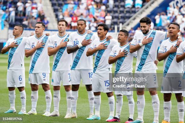 Carlos Mejía, Rubio Rubin, Aaron Herrera, Nathaniel Mendez-Laing, Marlon Sequen, Pedro Altán, Nicolás Samayoa and José Ardón of Guatemala stand for...