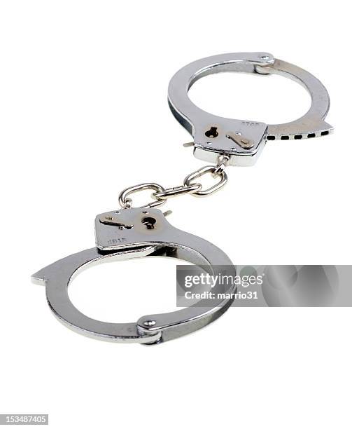 Handcuffz Handcuffs Isolated Photos and Premium High Res Pictures - Getty Images