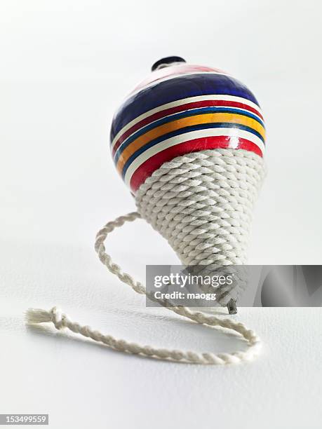 spinning top - spinning top stock pictures, royalty-free photos & images