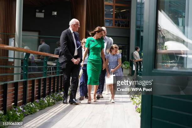 Catherine, Princess of Wales and Princess Charlotte arrive to attend day fourteen of the Wimbledon Tennis Championships at All England Lawn Tennis...