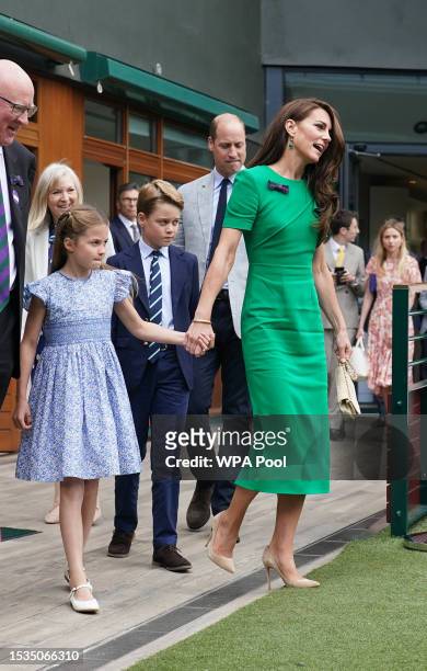 Catherine, Princess of Wales , Princess Charlotte , Prince George and Prince William, Prince of Wales arrive to attend day fourteen of the Wimbledon...