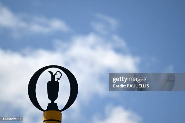 The claret Jug emblem is pictured on a direction sign as preparations continue ahead of the 151st British Open Golf Championship at Royal Liverpool...