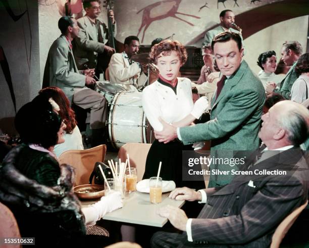 French actress Leslie Caron as Lise Bouvier, and American actor and dancer Gene Kelly as Jerry Mulligan, in 'An American in Paris', directed by...