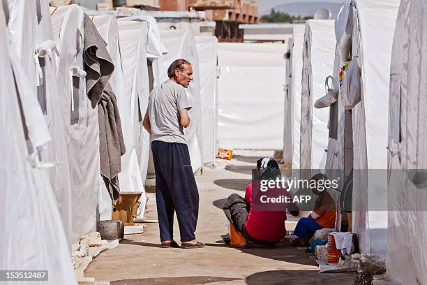 Syrians refugees are seen in a camp near the northern town of Azaz, on the border with Turkey, on October 5, 2012. Damascus' bloody crackdown on the...