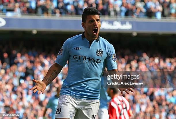 Sergio Aguero of Manchester City celebrates scoring his team's second goal during the Barclays Premier League match between Manchester City and...