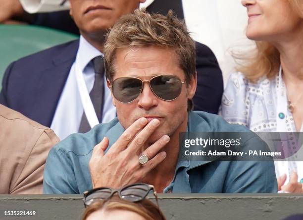 Brad Pitt watching the Gentlemen's Singles final on day fourteen of the 2023 Wimbledon Championships at the All England Lawn Tennis and Croquet Club...