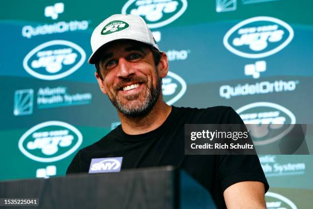 Quarterback Aaron Rodgers of the New York Jets talks to reporters after the teams OTAs at Atlantic Health Jets Training Center on June 9, 2023 in...