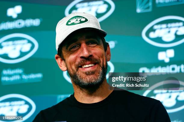 Quarterback Aaron Rodgers of the New York Jets talks to reporters after the teams OTAs at Atlantic Health Jets Training Center on June 9, 2023 in...