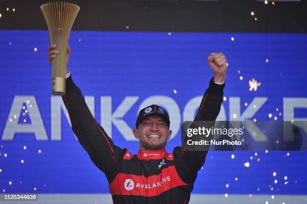 Jake Dennis of Great Britain and Avalanche Andretti reacts and celebrates with golden trophy on podium after winning Race 2 during Formula E 2023...