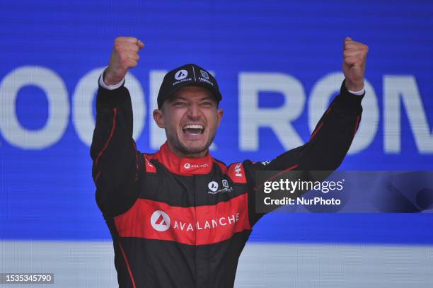 Jake Dennis of Great Britain and Avalanche Andretti reacts and celebrates on podium after winning Race 2 during Formula E 2023 Rome E-Prix at the...