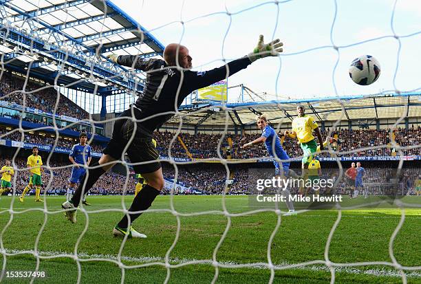 Fernando Torres of Chelsea beats goalkeeperJohn Ruddy of Norwich City to score their first goal during the Barclays Premier League match between...